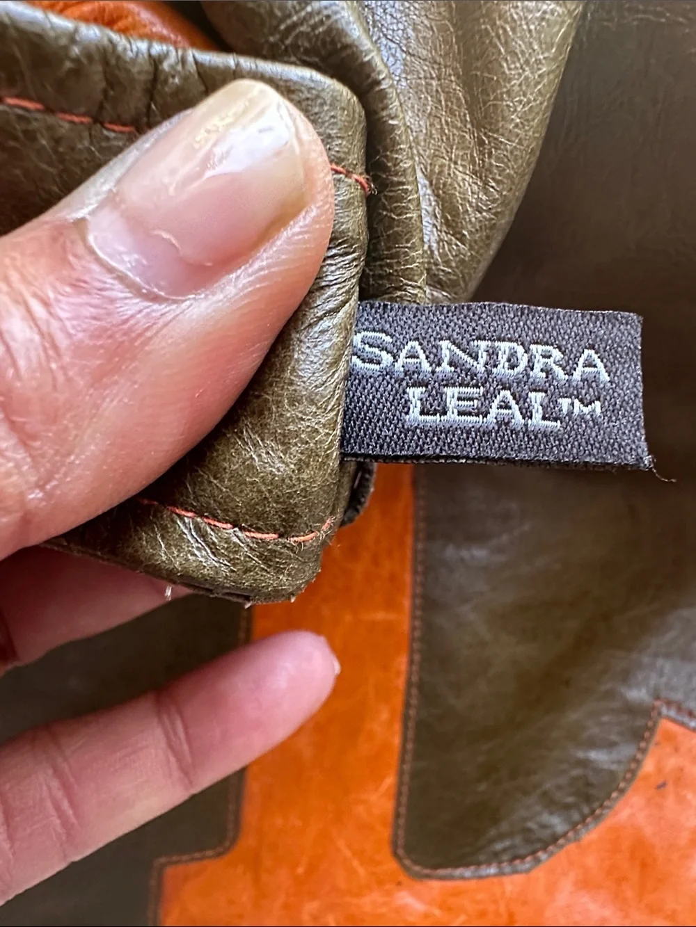 Sandra Lea Leather Messenger Bag with Orange 'L' Accent
